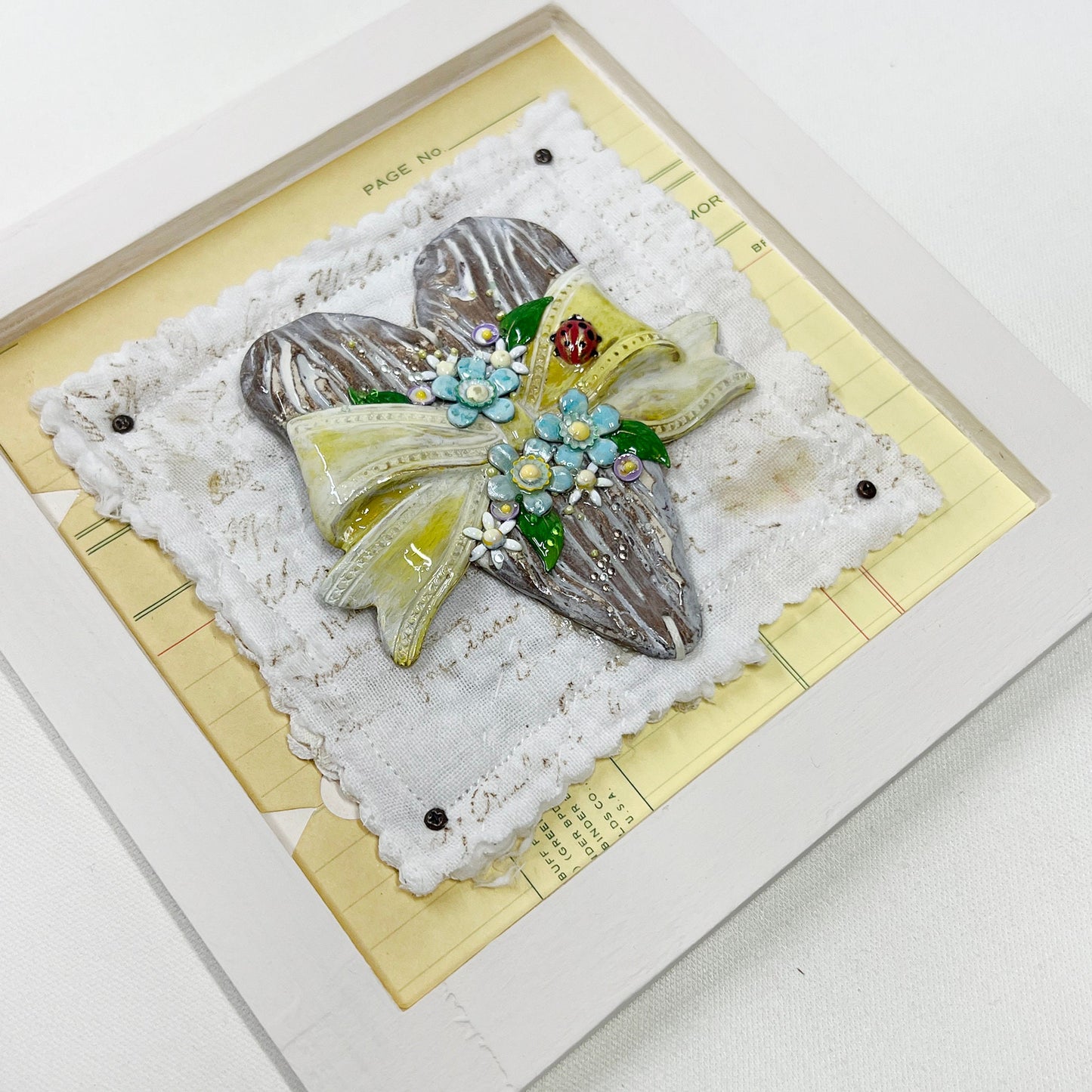 Handmade Heartfelt Sampler 4: framed hand sculpted heart with hand-painted enameled flowers by artist Tammy Tutterow