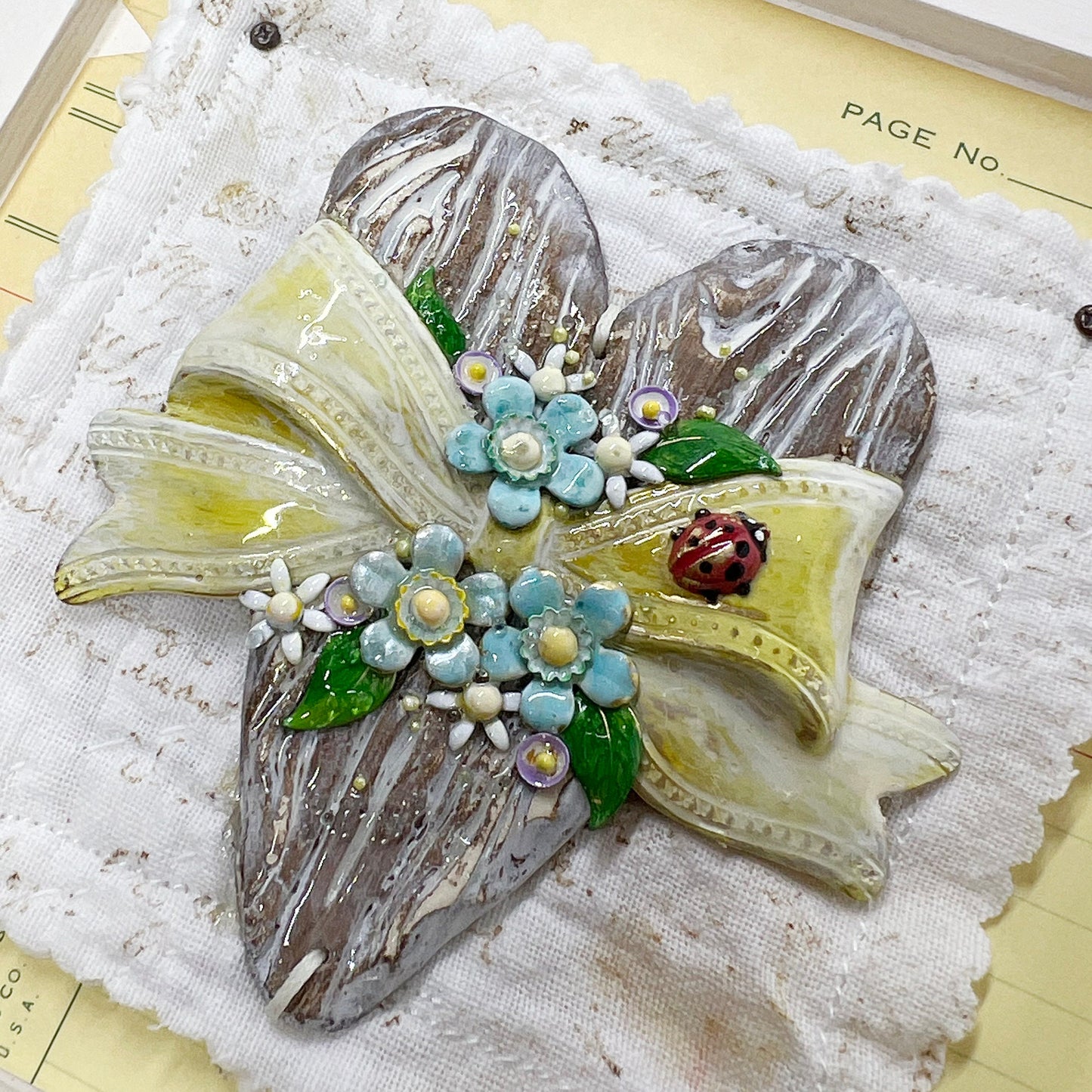 Handmade Heartfelt Sampler 4: framed hand sculpted heart with hand-painted enameled flowers by artist Tammy Tutterow