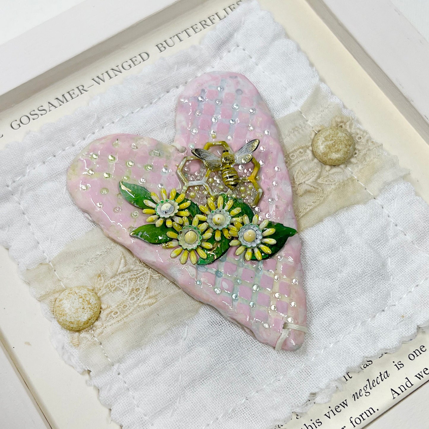 Handmade Heartfelt Sampler 7: framed hand sculpted heart with hand-painted enameled flowers by artist Tammy Tutterow