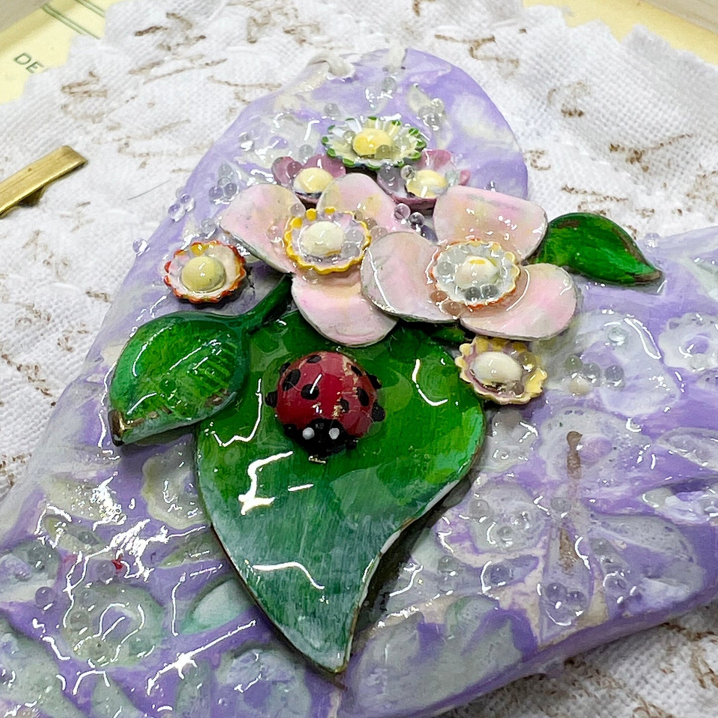 Handmade Heartfelt Sampler 8: framed hand sculpted heart with hand-painted enameled flowers by artist Tammy Tutterow