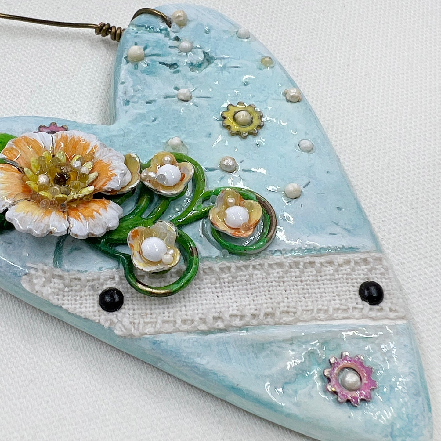 Handmade Heartfelt Ornament 1: hand sculpted heart with mixed media hand-painted enameled flowers by artist Tammy Tutterow