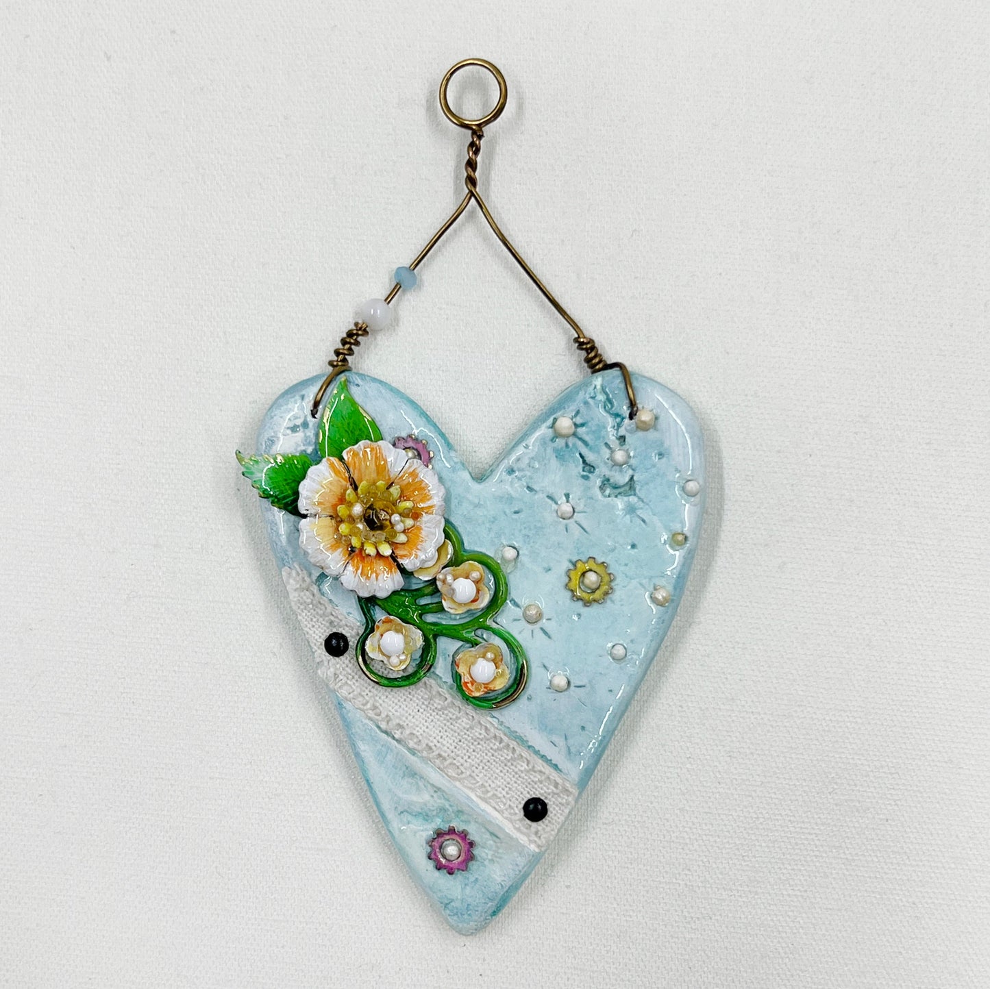 Handmade Heartfelt Ornament 1: hand sculpted heart with mixed media hand-painted enameled flowers by artist Tammy Tutterow