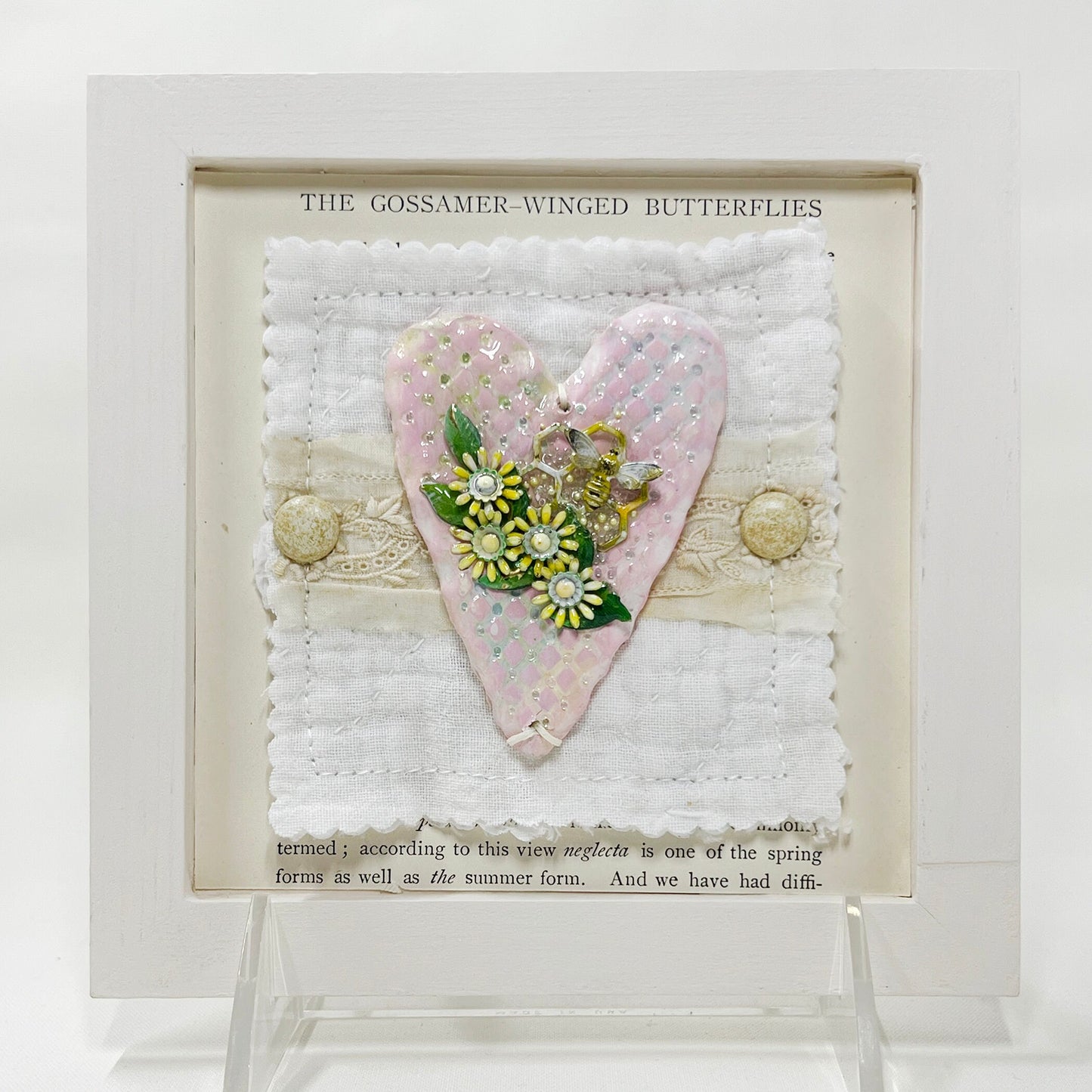 Handmade Heartfelt Sampler 7: framed hand sculpted heart with hand-painted enameled flowers by artist Tammy Tutterow