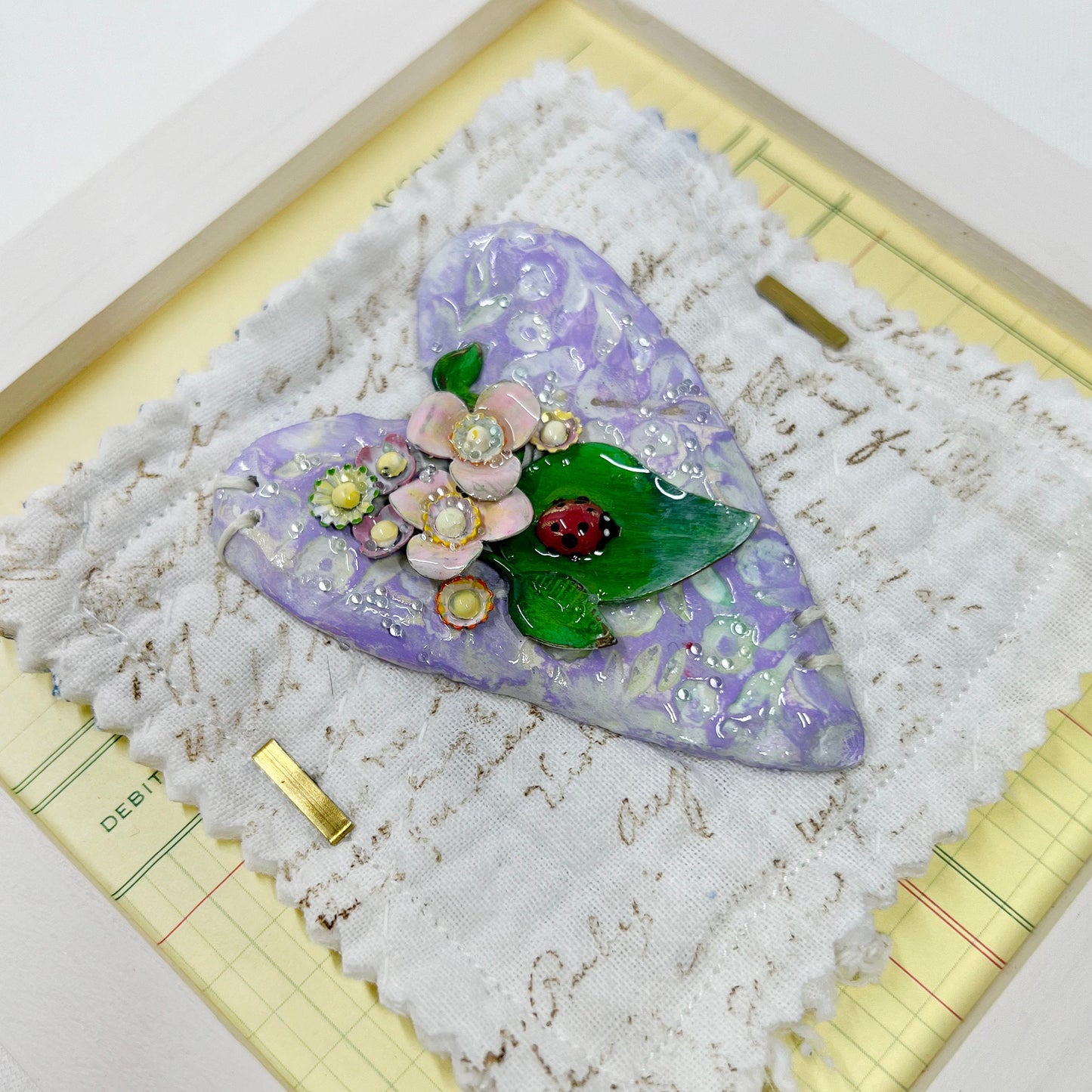 Handmade Heartfelt Sampler 8: framed hand sculpted heart with hand-painted enameled flowers by artist Tammy Tutterow