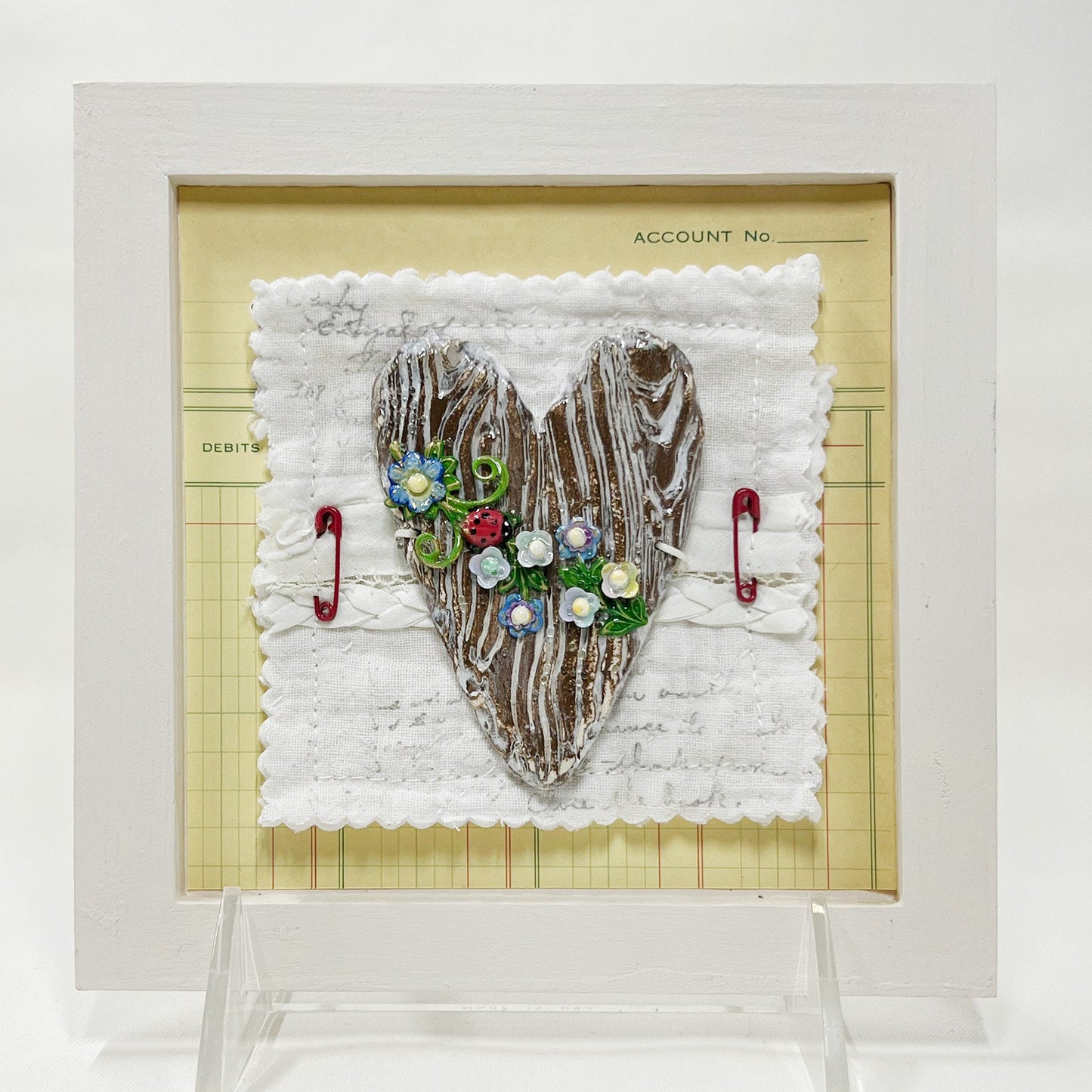 Handmade Heartfelt Sampler 10: framed hand sculpted heart with hand-painted enameled flowers by artist Tammy Tutterow