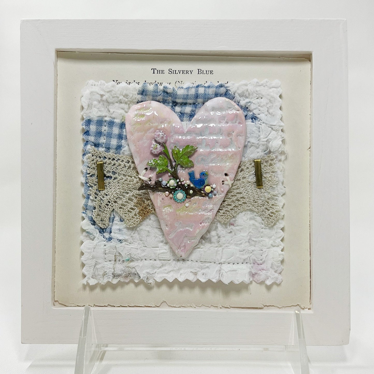 Handmade Heartfelt Sampler 11: framed hand sculpted heart with hand-painted enameled flowers by artist Tammy Tutterow