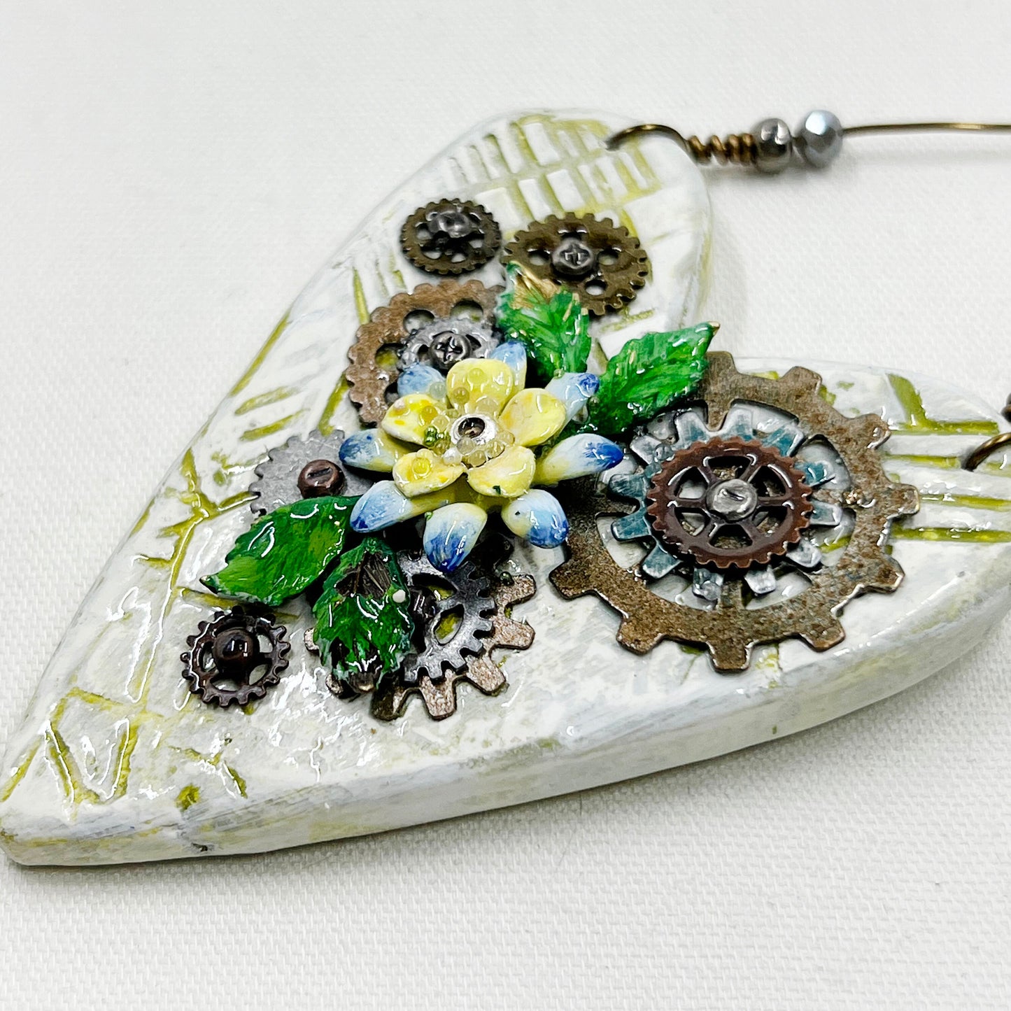 Handmade Heartfelt Ornament 10: hand sculpted heart with mixed media hand-painted enameled flowers by artist Tammy Tutterow