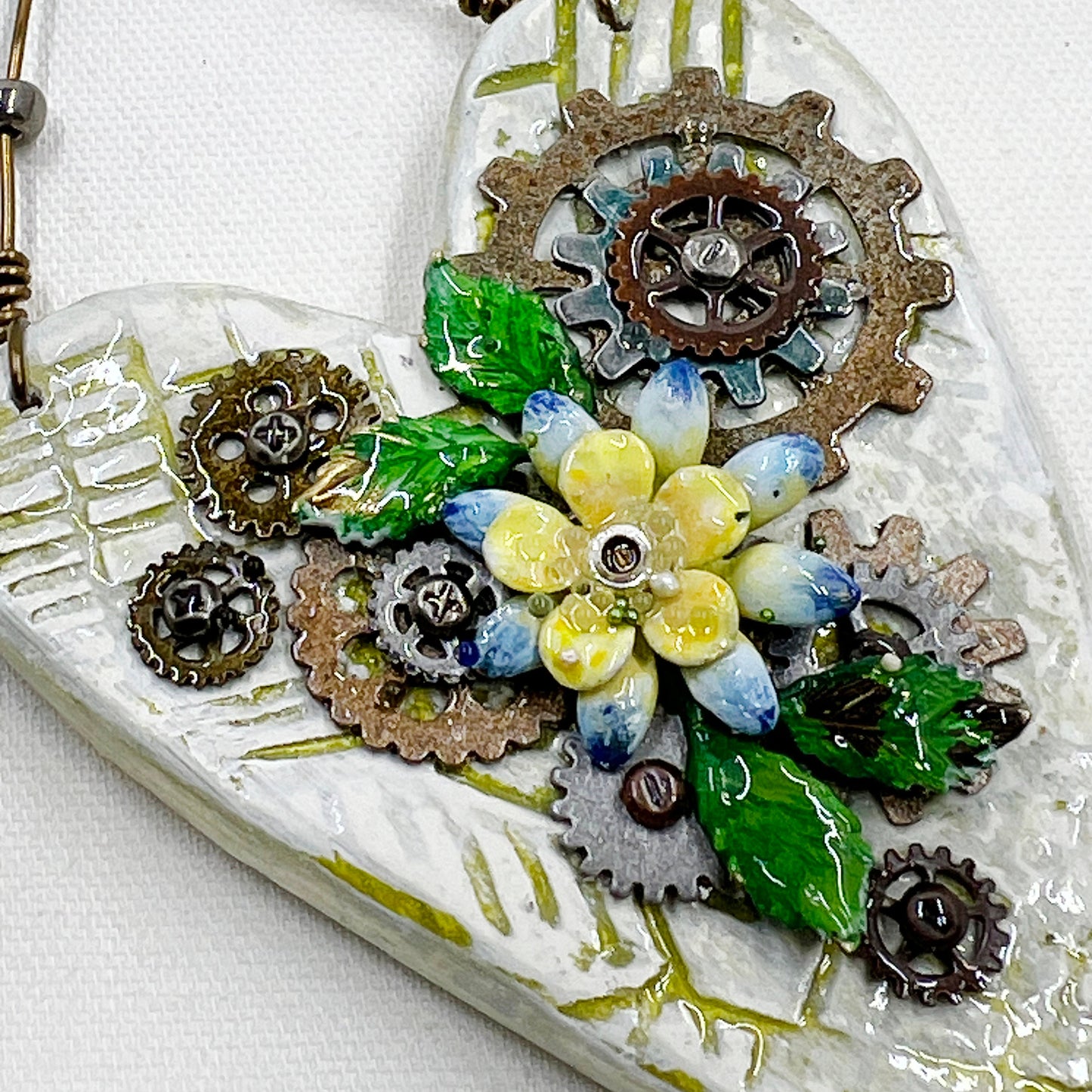 Handmade Heartfelt Ornament 10: hand sculpted heart with mixed media hand-painted enameled flowers by artist Tammy Tutterow