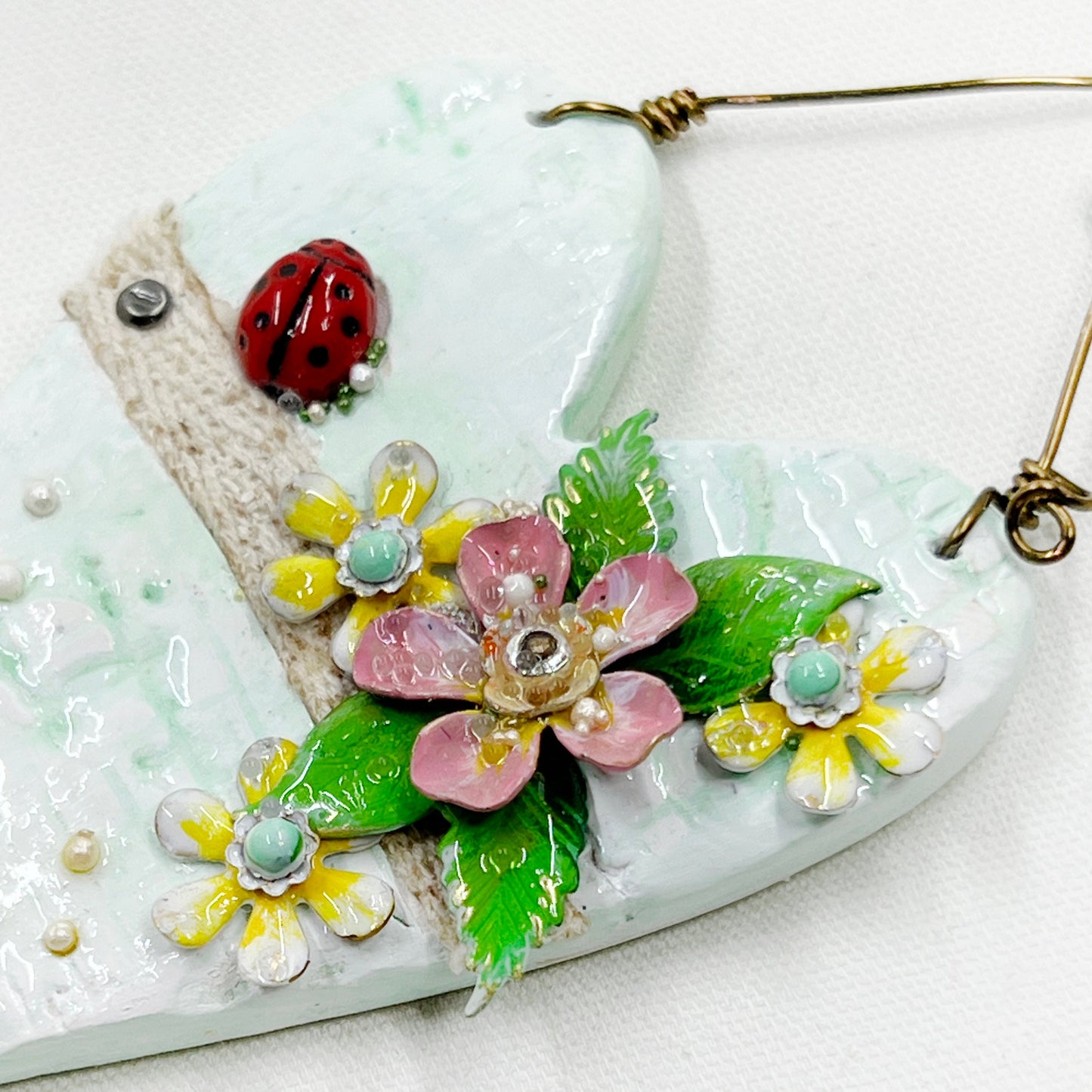 Handmade Heartfelt Ornament 11: hand sculpted heart with mixed media hand-painted enameled flowers by artist Tammy Tutterow