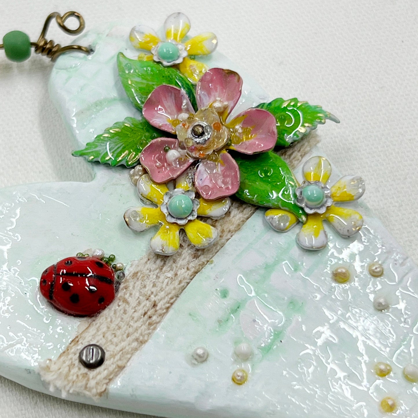 Handmade Heartfelt Ornament 11: hand sculpted heart with mixed media hand-painted enameled flowers by artist Tammy Tutterow