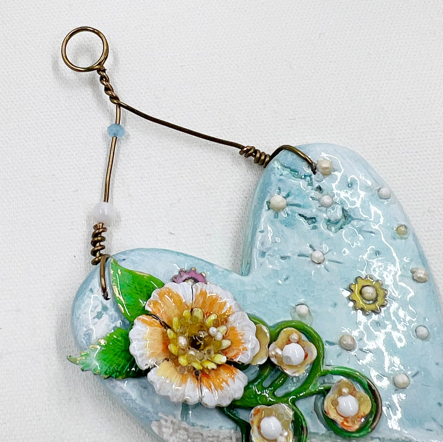 Handmade Heartfelt Ornament 1: hand sculpted heart with mixed media hand-painted enameled flowers by artist Tammy Tutterow