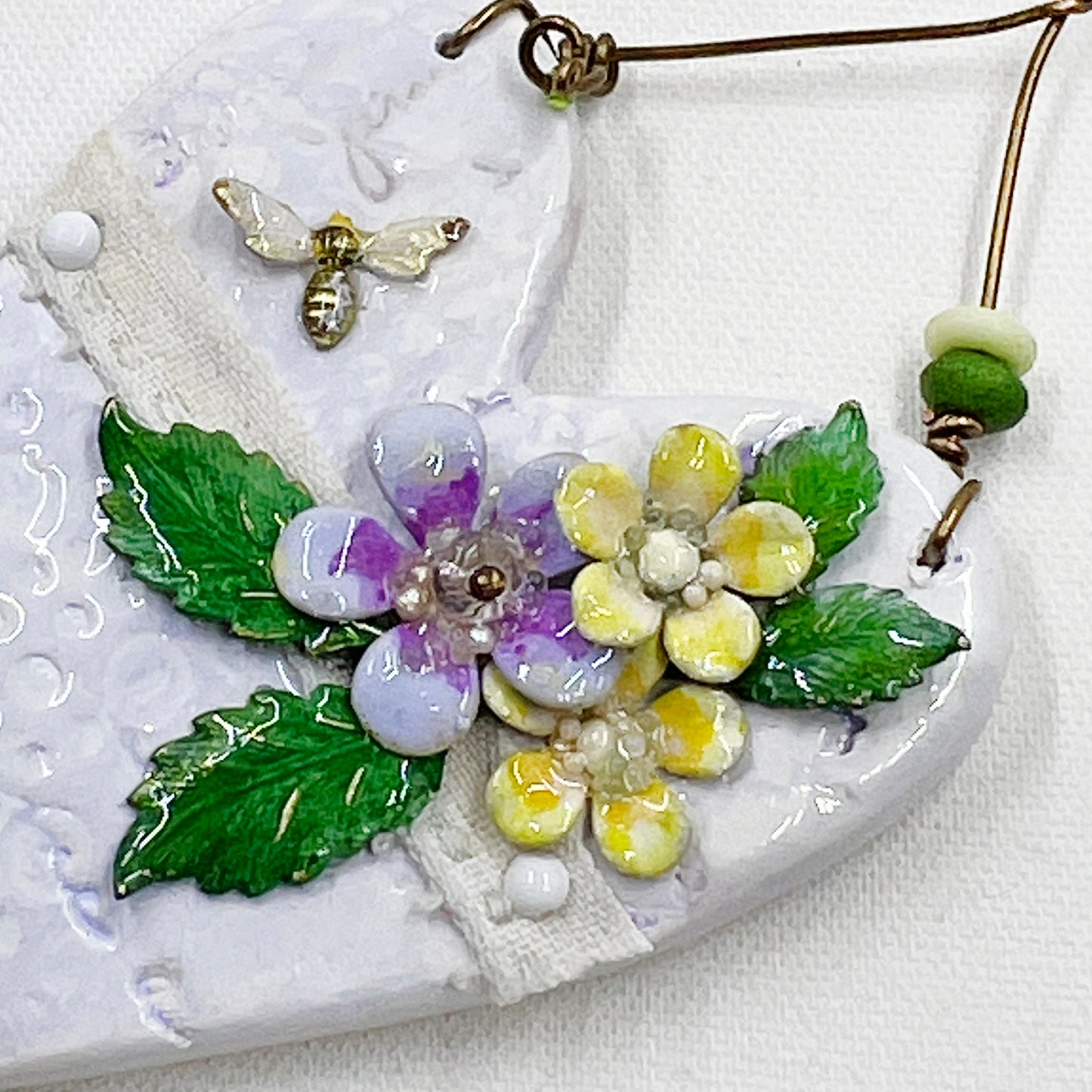 Handmade Heartfelt Ornament 9: hand sculpted heart with mixed media hand-painted enameled flowers by artist Tammy Tutterow