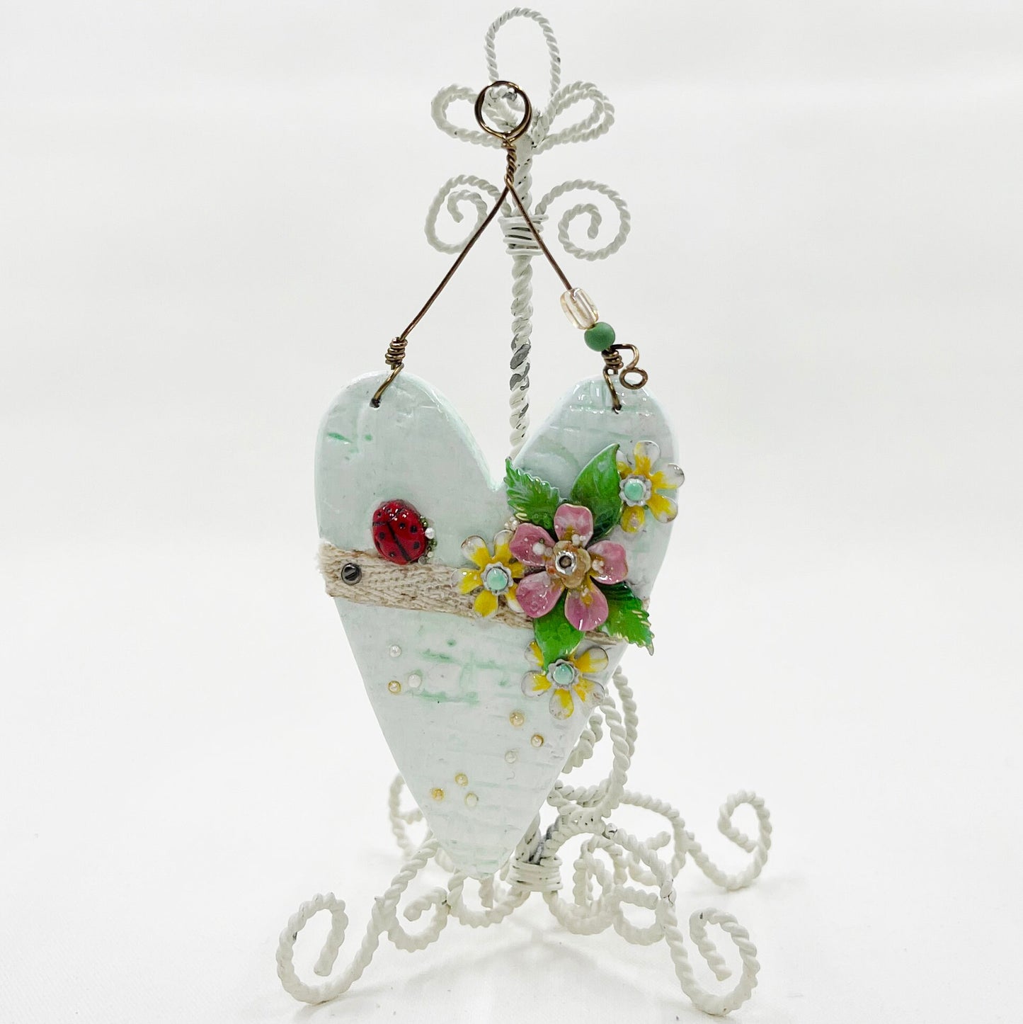 Handmade Heartfelt Ornament 11: hand sculpted heart with mixed media hand-painted enameled flowers by artist Tammy Tutterow