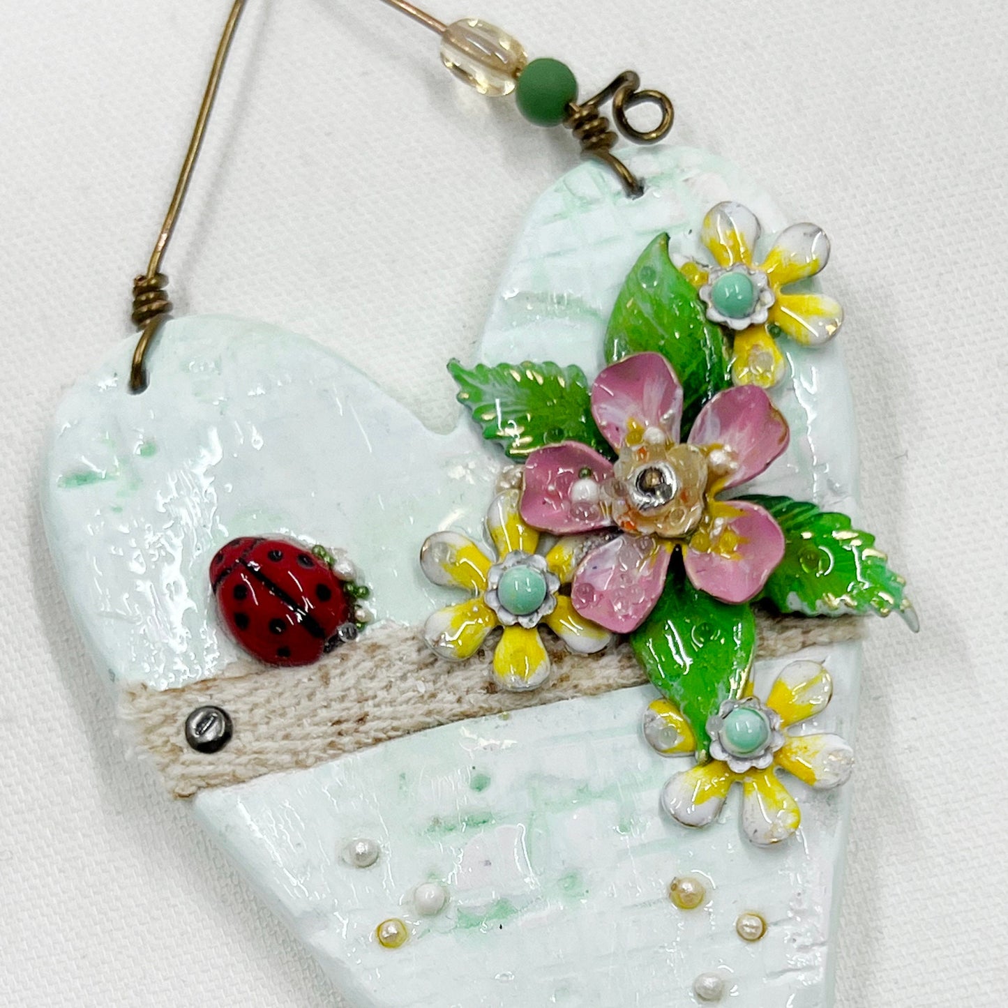 Handmade Heartfelt Ornament 11: hand sculpted heart with mixed media hand-painted enameled flowers by artist Tammy Tutterow