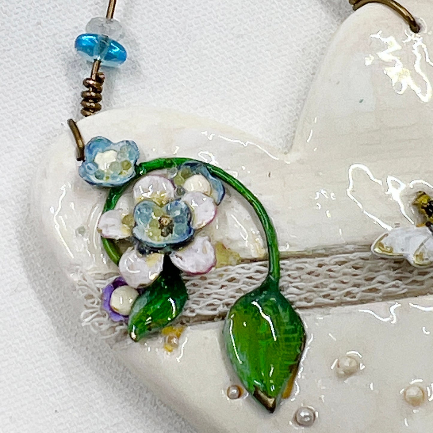 Handmade Heartfelt Ornament 14: hand sculpted heart with mixed media hand-painted enameled flowers by artist Tammy Tutterow