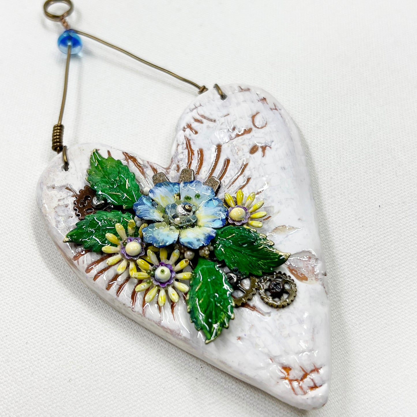 Handmade Heartfelt Ornament 15: hand sculpted heart with mixed media hand-painted enameled flowers by artist Tammy Tutterow