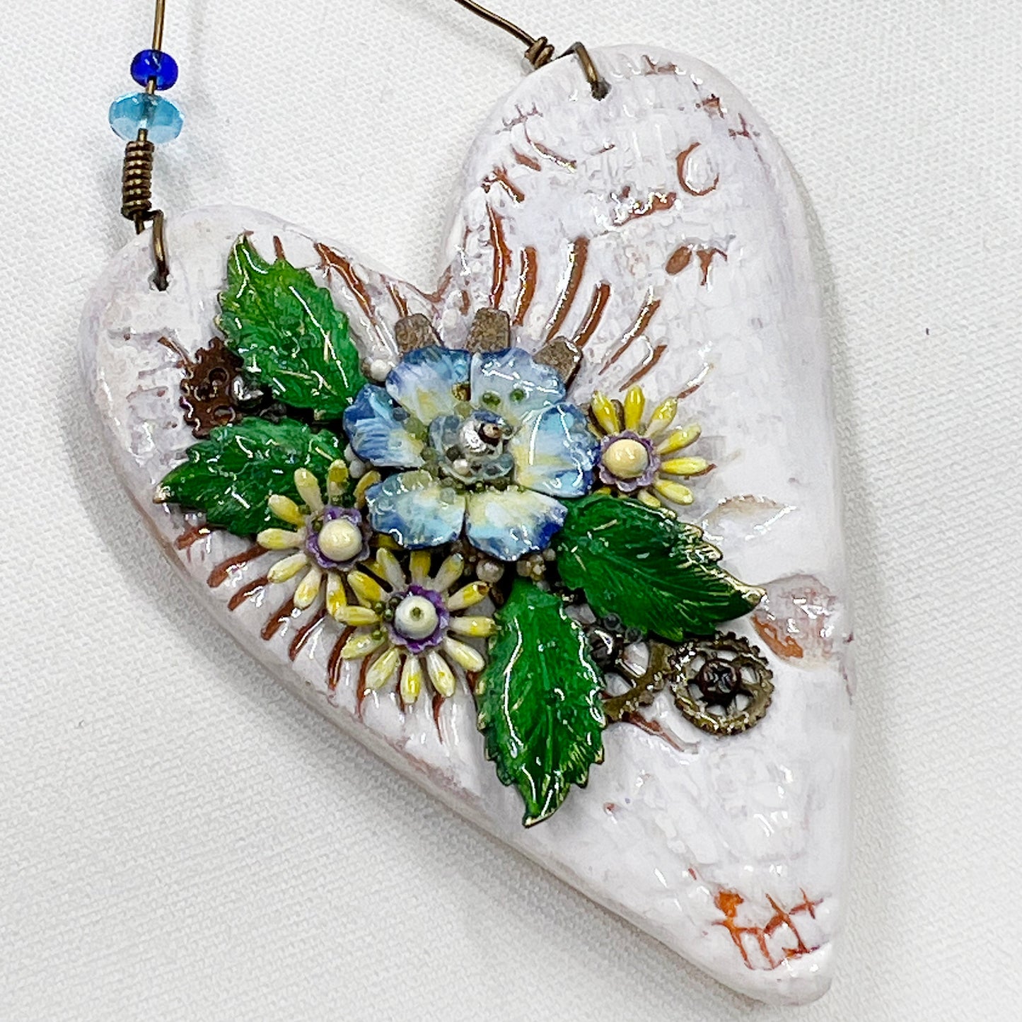 Handmade Heartfelt Ornament 15: hand sculpted heart with mixed media hand-painted enameled flowers by artist Tammy Tutterow