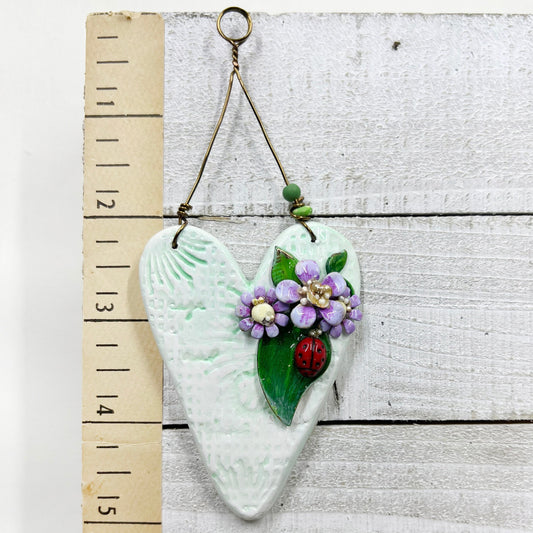 Handmade Heartfelt Ornament 13: hand sculpted heart with mixed media hand-painted enameled flowers by artist Tammy Tutterow