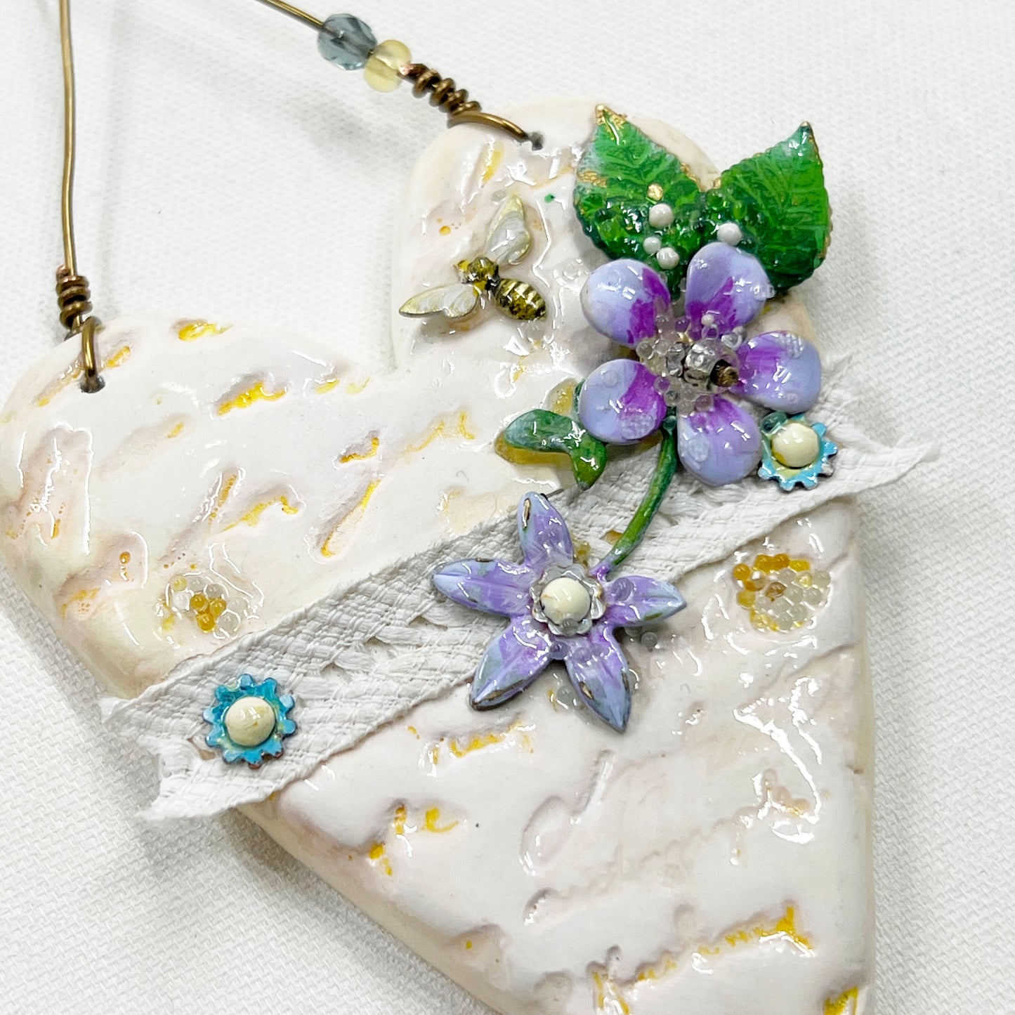 Handmade Heartfelt Ornament 16: hand sculpted heart with mixed media hand-painted enameled flowers by artist Tammy Tutterow